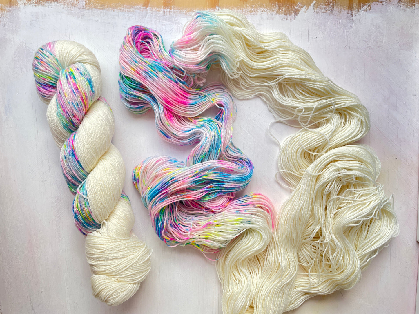 Champagne Supernova Long Zip 4ply sock yarn from the Assigned Pooling Yarns collection by the hand dyed yarn expert, The Wool Kitchen