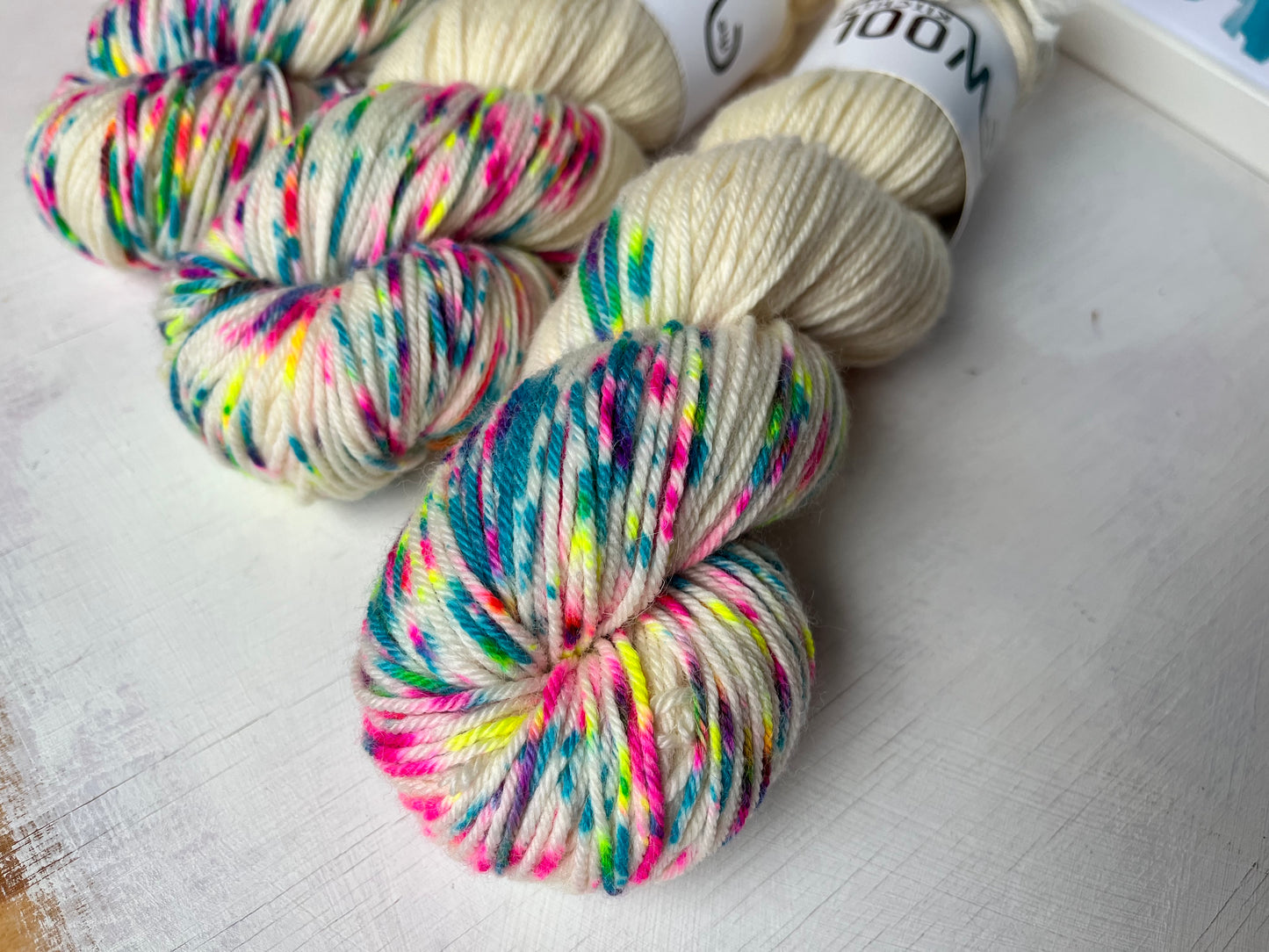 Close up of Champagne Supernova from the BFL DK Wool collection by the hand dyed yarn expert, The Wool Kitchen.