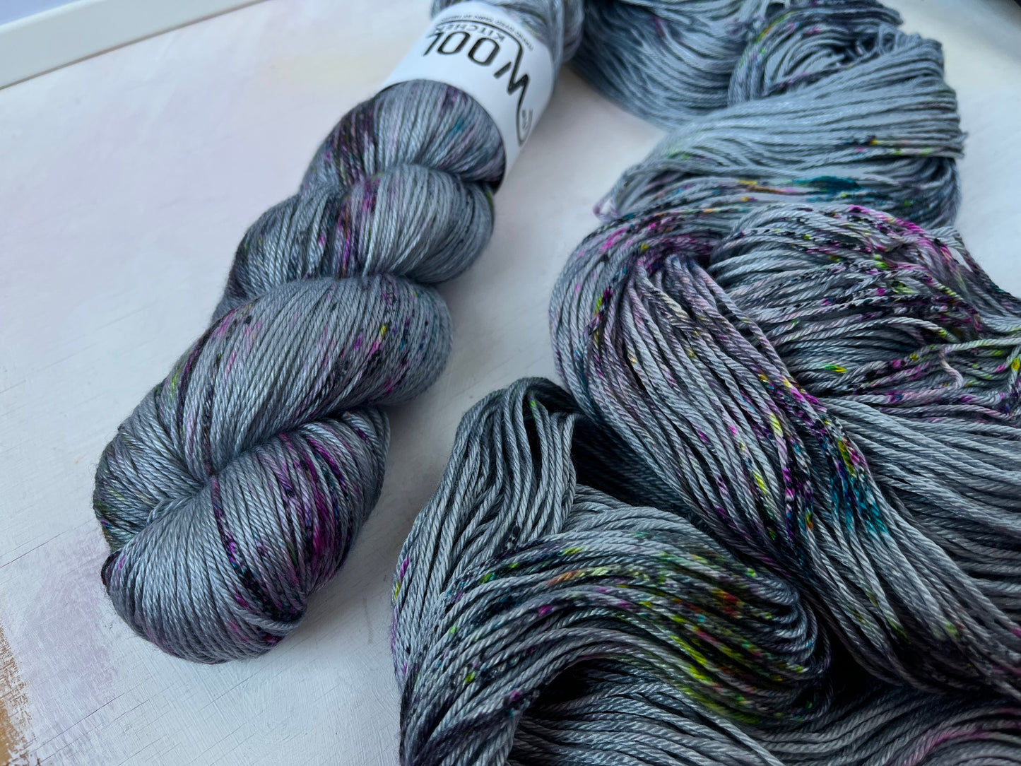 Close up of Mystic Grey yarn from the Luxury 4ply silk yarn collection by the hand dyed yarn expert, The Wool Kitchen.