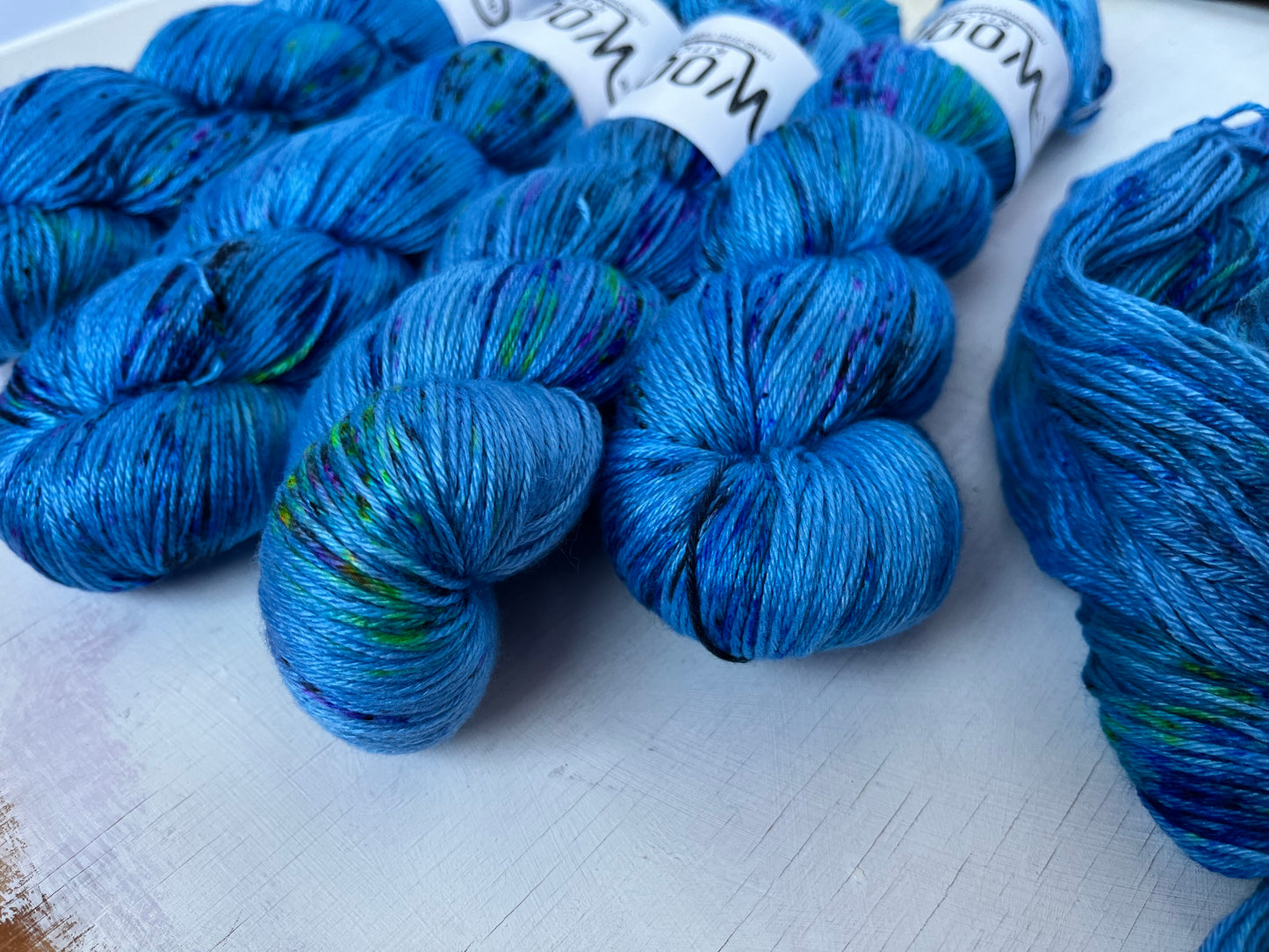 Close up of Mystic Blue yarn from the Luxury 4ply silk yarn collection by the hand dyed yarn expert, The Wool Kitchen.