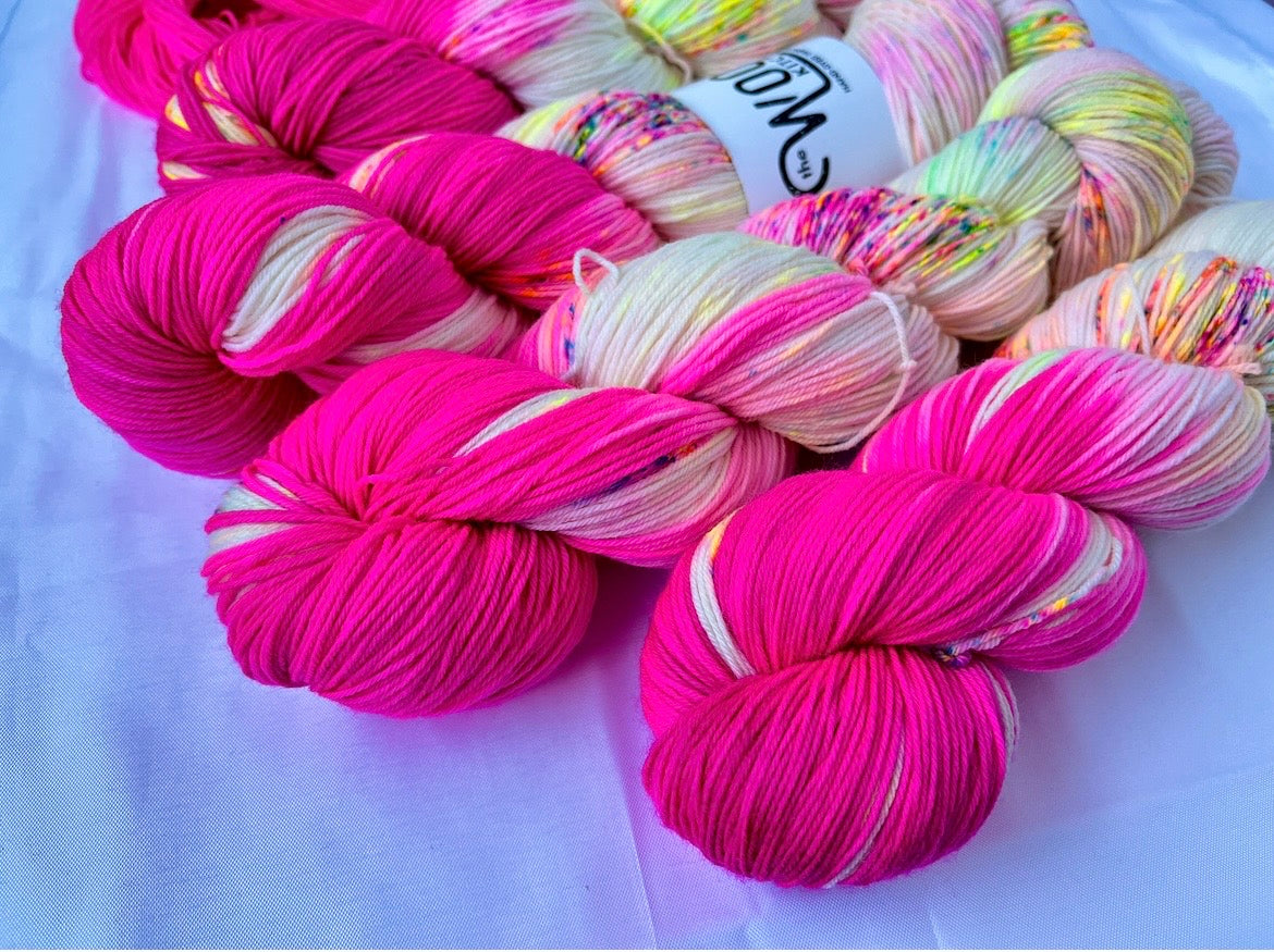 Close up of Reverse Pops Grey Zip Yarn from the 4ply sock collection by the hand dyed yarn expert, The Wool Kitchen.