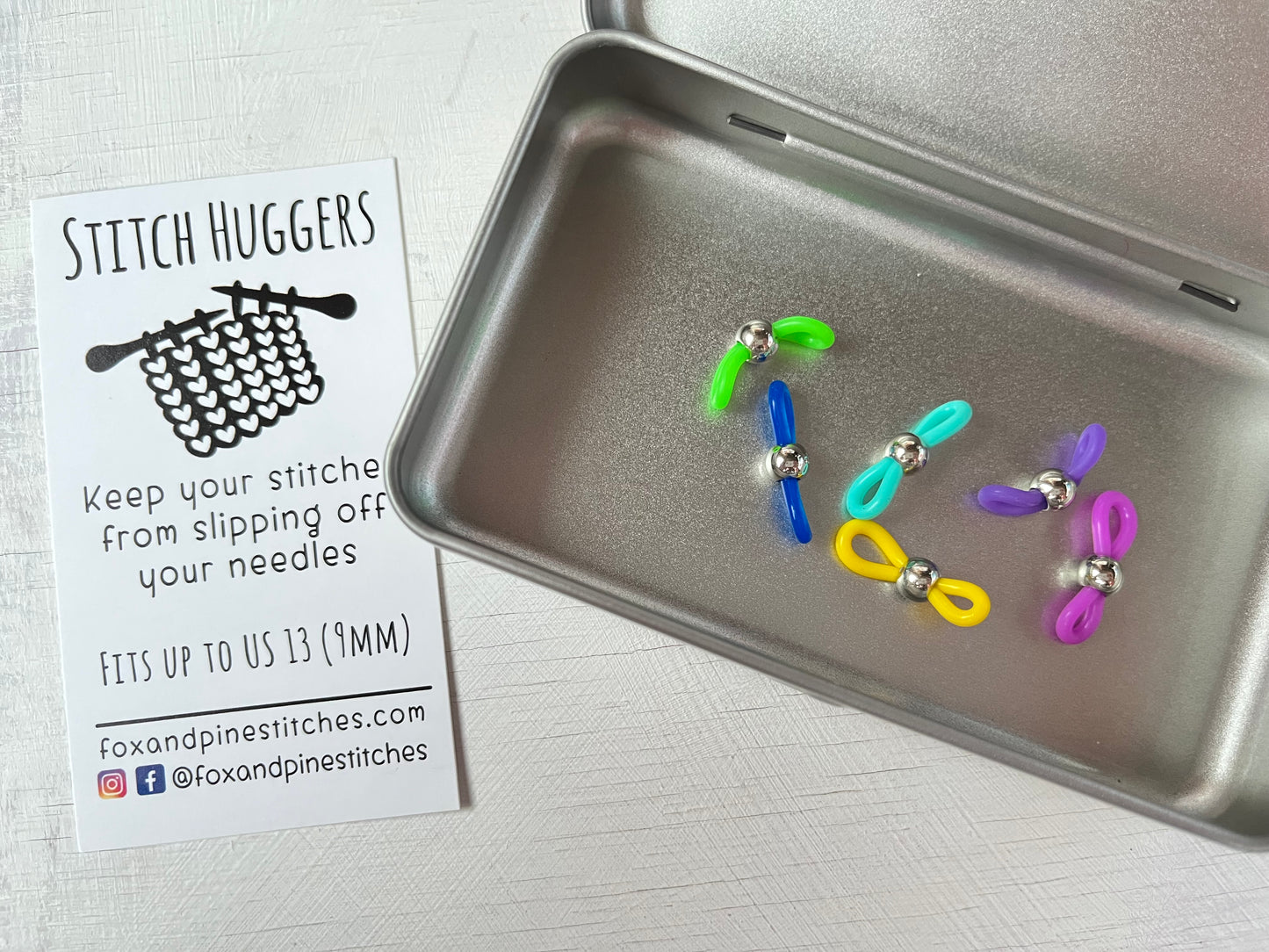 Close up in a tin, Stitch Huggers by Fox and Pine from the accessories collection by the hand dyed yarn expert, The Wool Kitchen