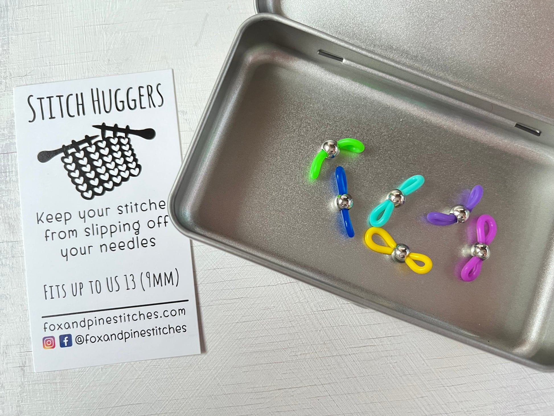 Close up in a tin, Stitch Huggers by Fox and Pine from the accessories collection by the hand dyed yarn expert, The Wool Kitchen