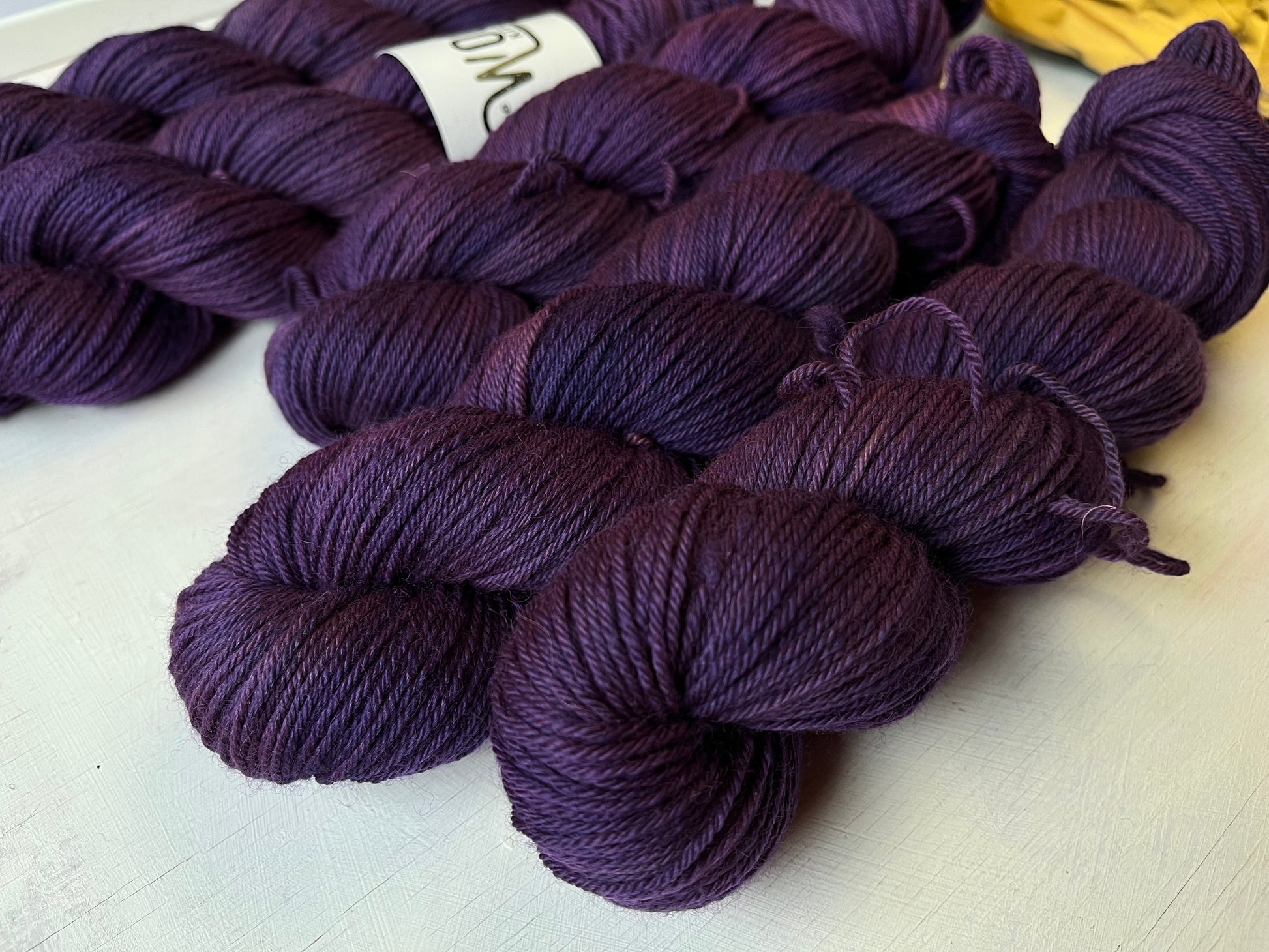 Close up of Practice Makes Purple from the BFL DK wool collection by the hand dyed yarn expert, The Wool Kitchen.