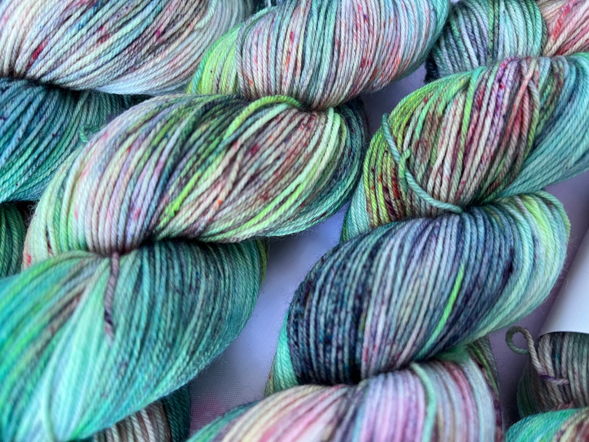 Extreme close up of Image 3 on 4ply Sock from the Seashells Monthly Yarn club by the hand dyed yarn expert, The Wool Kitchen. 