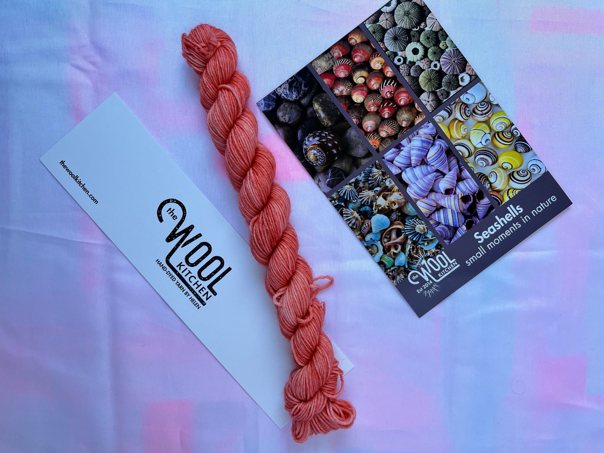 Warm Coral 20g mini skein from Image 3 on 4ply Sock from the Seashells Monthly Yarn club by the hand dyed yarn expert, The Wool Kitchen. 