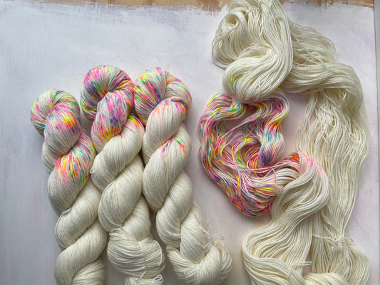 Champagne Supernova from the Zip Yarn 4ply sock yarn collection by the hand dyed yarn expert, The Wool Kitchen