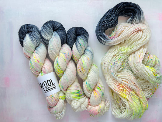 Reverse Pops Grey Zip Yarn from the 4ply sock collection by the hand dyed yarn expert, The Wool Kitchen.