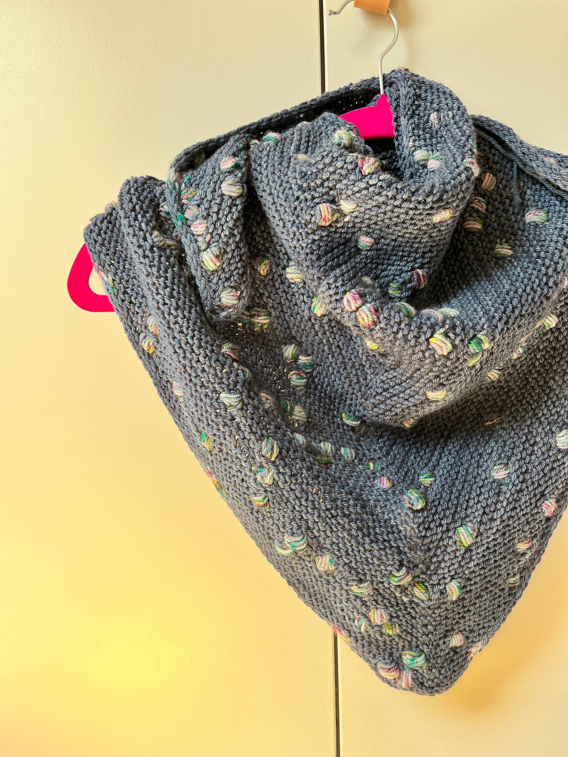 Loop Pop Shawl assigned pooling pattern shown in Stardust BFL DK Wool from the hand dyed yarn expert, The Wool Kitchen.