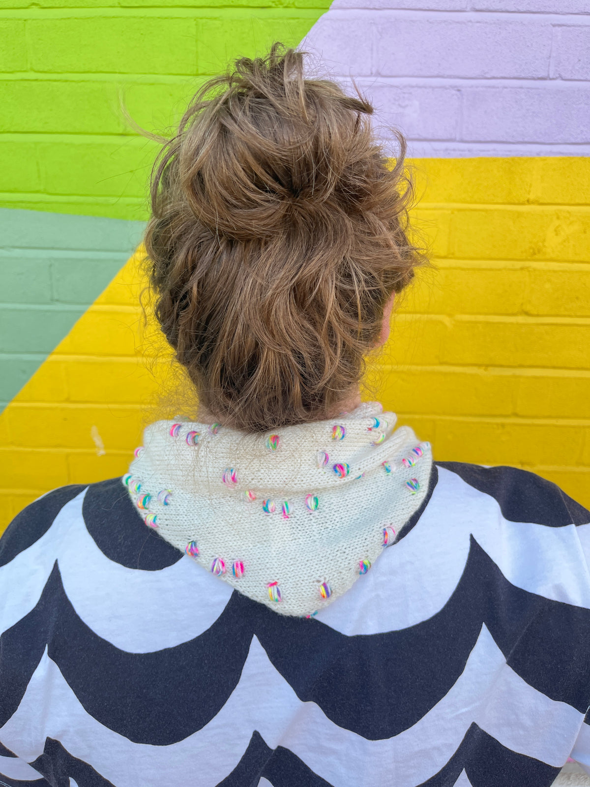 Rear view of 101 Assign It Bandana Pattern by Helen Reed in Champagne Supernova Zip Yarn on 4ply Sock from the Wool Kitchen.
