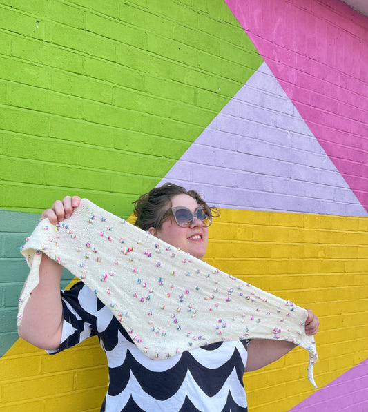 101 Assign It Bandana Pattern by Helen Reed in Champagne Supernova Zip Yarn on 4ply Sock from the Wool Kitchen.